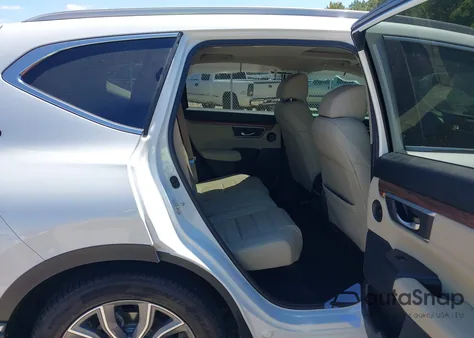 2020 Honda Cr-V Hybrid Touring from USA, damaged, VIN 7FART6H92LE024749